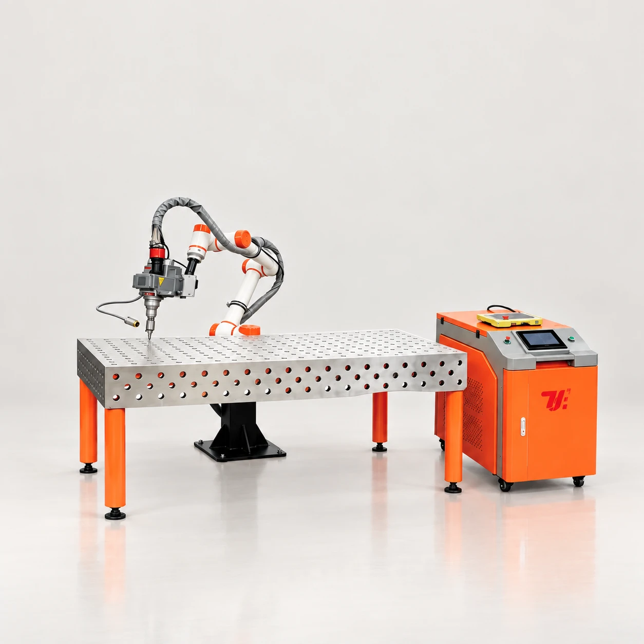 Collaborative robot laser welding workstation with perforated worktable and control cabinet